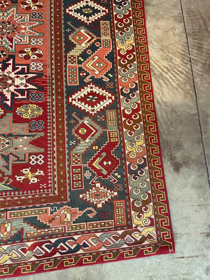 Early 20th Century Hand-Knotted Kazak Rug | 10'4" x 6'9"