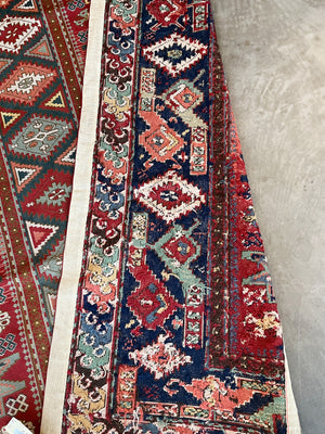 Early 20th Century Hand-Knotted Kazak Rug | 10'4" x 6'9"